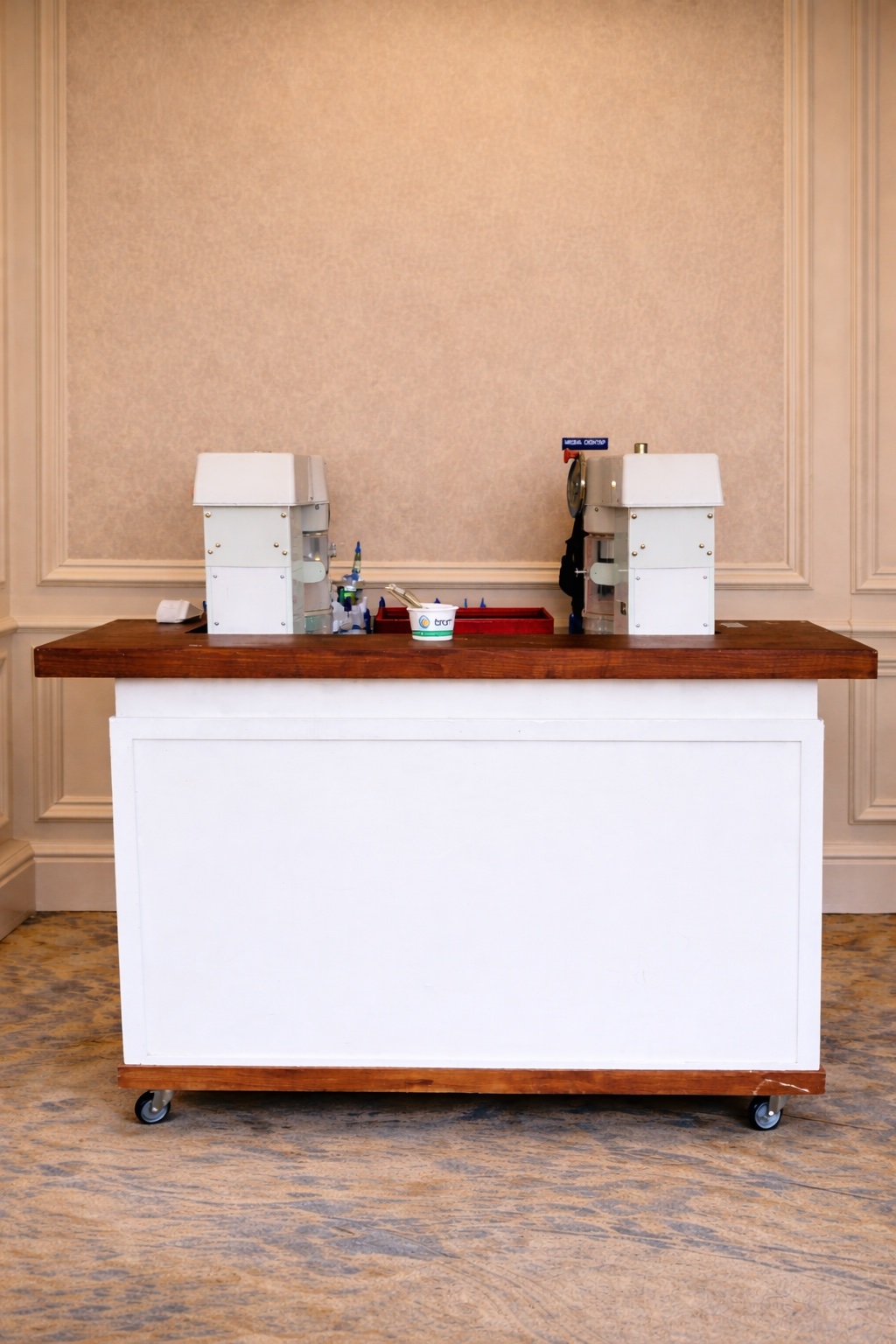 Marina Ice Co. team with shave ice bar at indoor corporate event